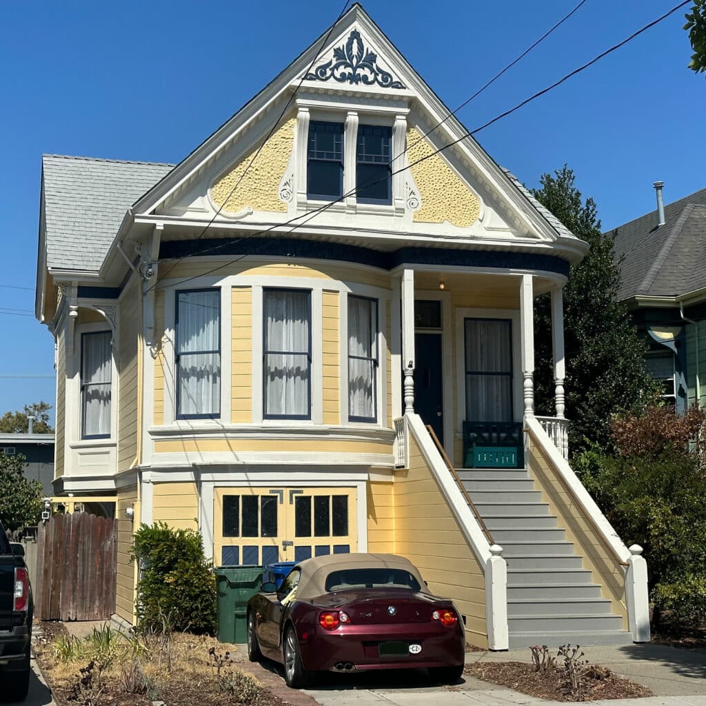 Alameda Post - a yellow Queen Anne-style cottage home