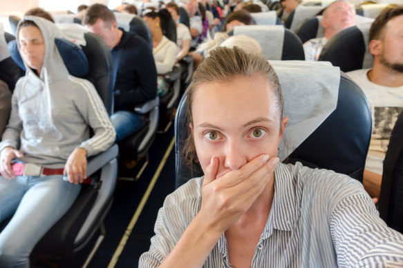 To avoid getting sick on a plane, choose your seat wisely