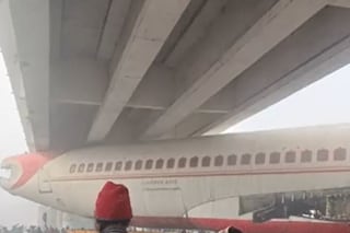 WATCH | Scrapped Aeroplane, Being Transported on Truck, Gets Stuck Under Bridge on Bihar Highway