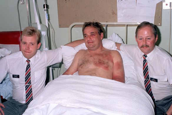 Unbelievably, Captain Tim Lancaster (centre) survived being half-sucked out the windshield for 18 minutes. Stewards Simon Rogers (left) and Nigel Ogden (right) saved him.