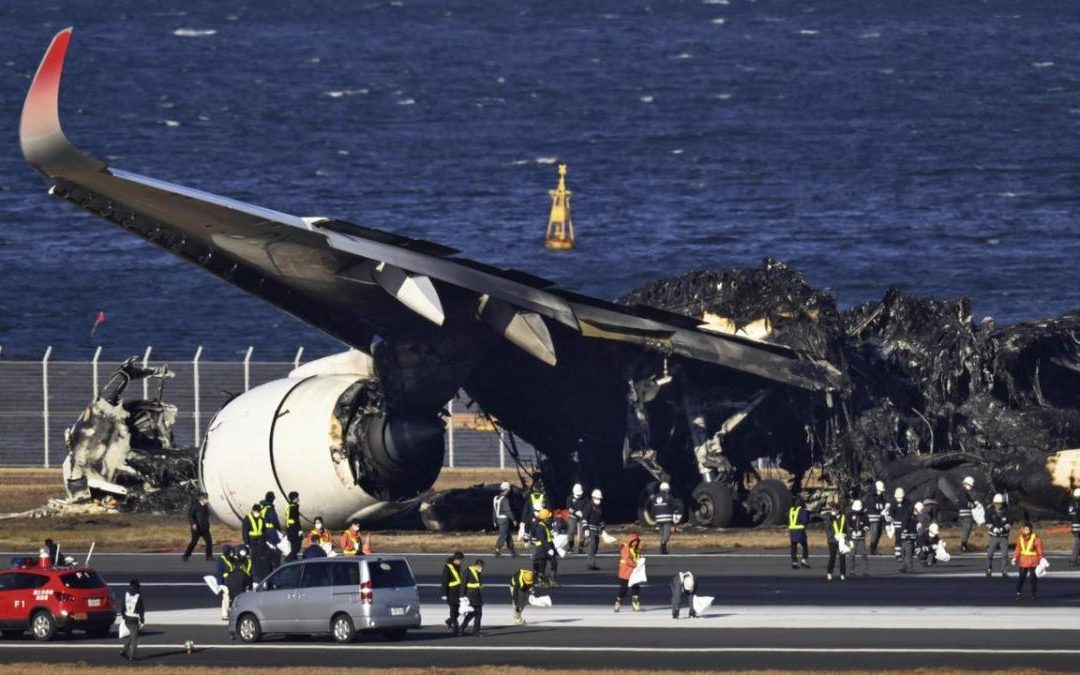 Crews begin cleanup from Japan planes collision