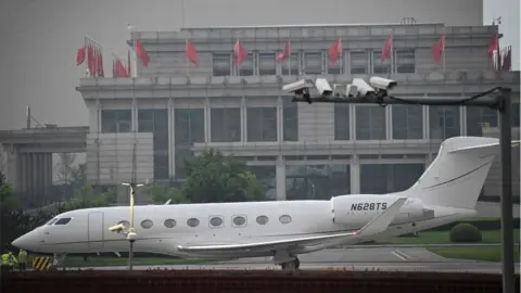 Getty Images Elon Musk's private jet on a runway in Beijing last year